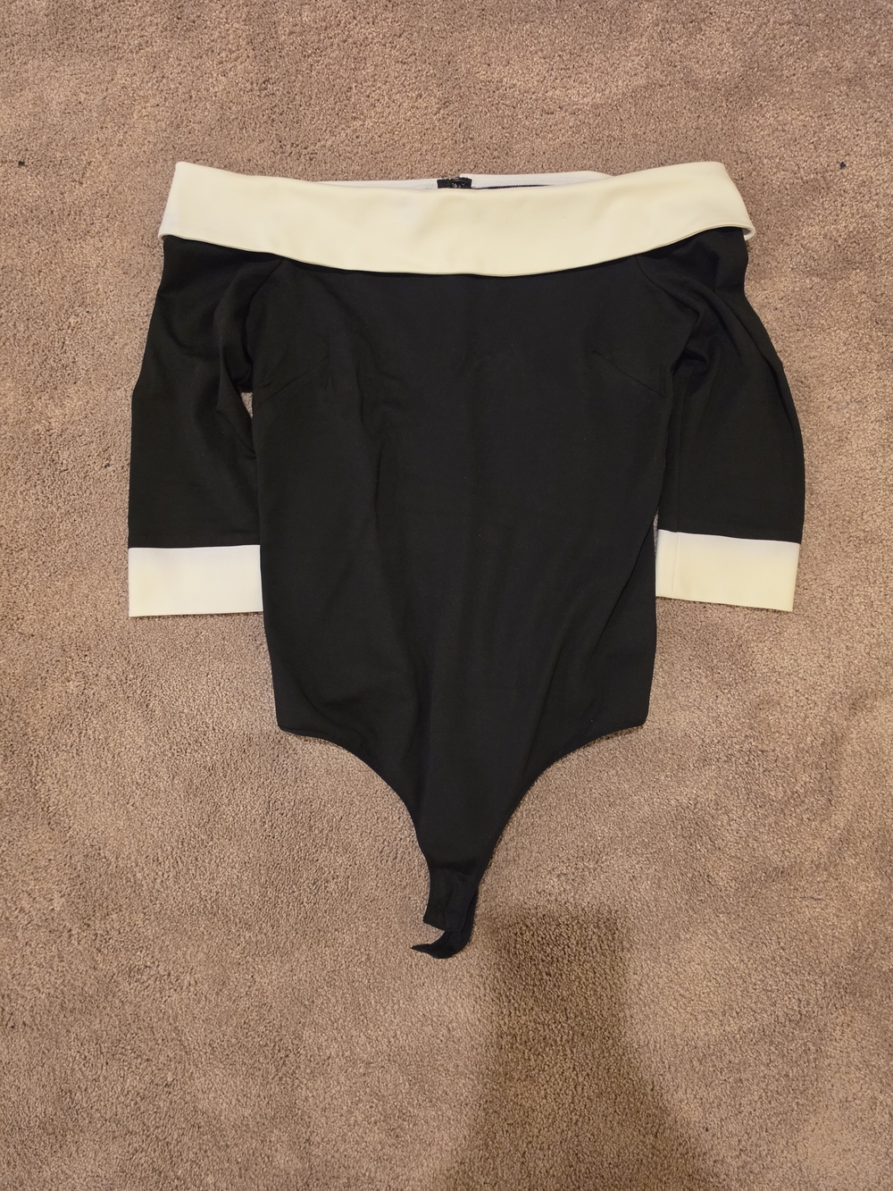 bebe Black and Cream Off-Shoulder Bodysuit